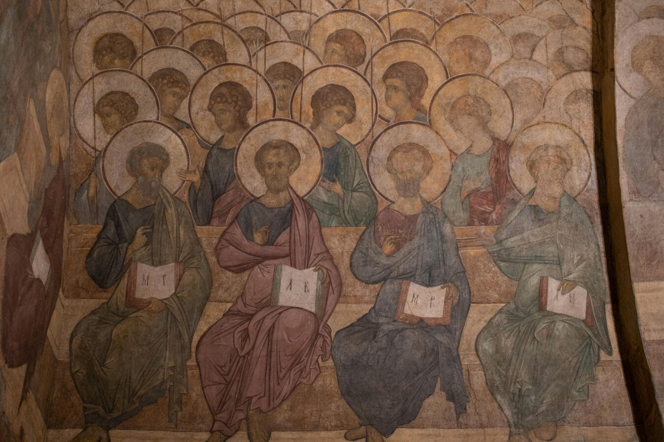 Intricate fresco depicting saints in an Orthodox church setting, showcasing historic religious art.